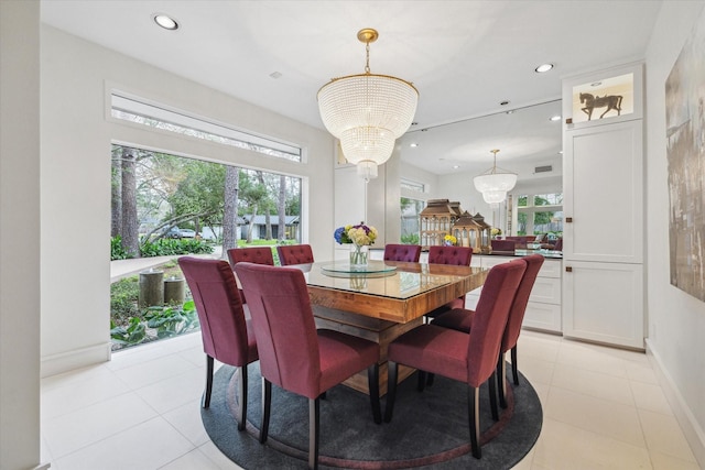 dining space with an inviting chandelier, light tile patterned floors, recessed lighting, and baseboards