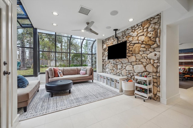 tiled living area with recessed lighting, visible vents, and ceiling fan