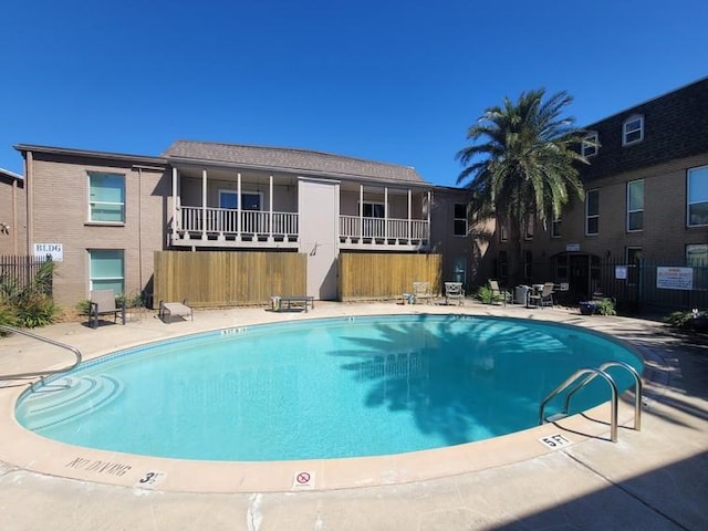 pool featuring fence