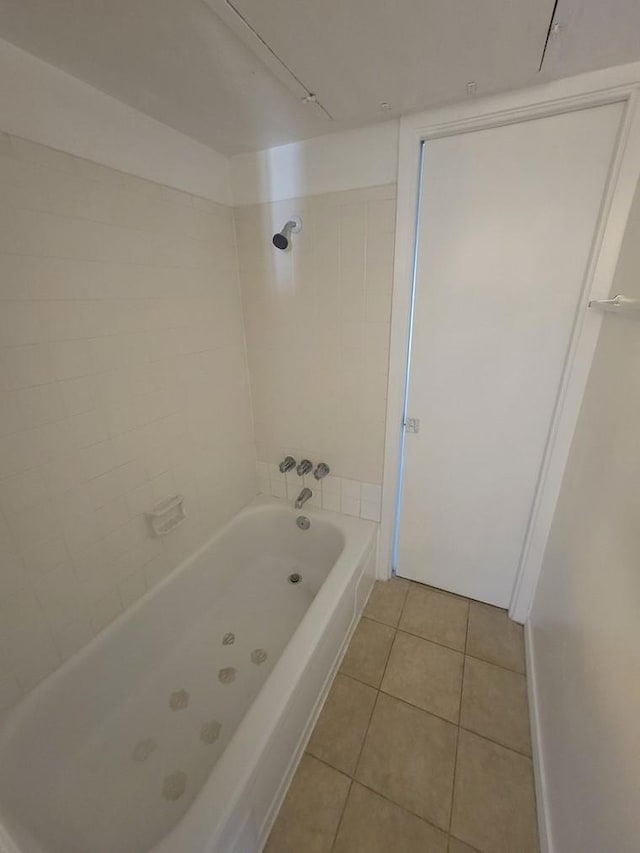 bathroom featuring tile patterned floors and shower / bathtub combination