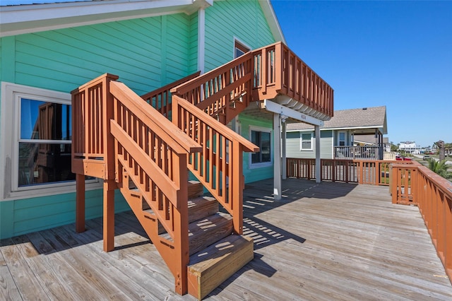 wooden terrace featuring stairway