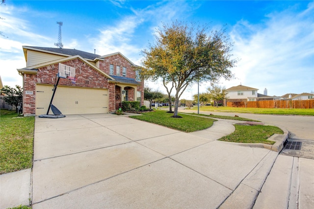 traditional-style house with brick siding, driveway, a front yard, and fence