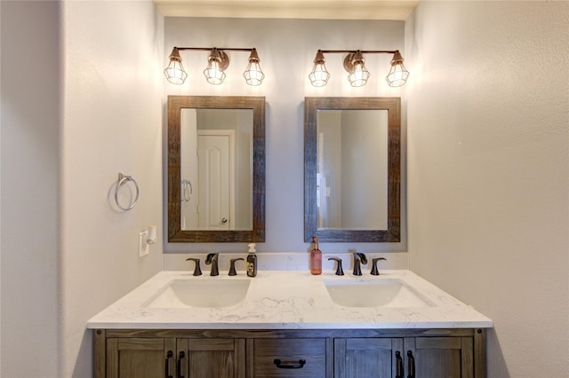 bathroom with double vanity and a sink