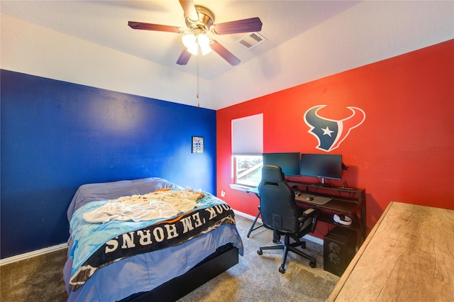 bedroom with visible vents, baseboards, lofted ceiling, ceiling fan, and carpet flooring