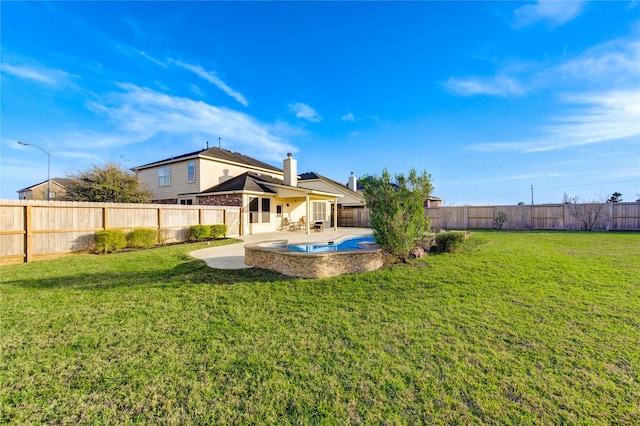 view of yard with a patio and a fenced backyard