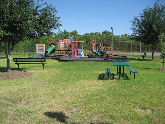 communal playground with a yard