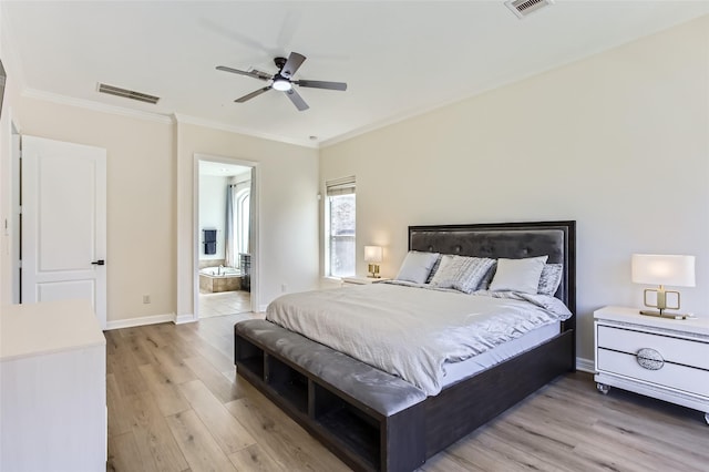 bedroom with crown molding, light wood-style flooring, baseboards, and visible vents