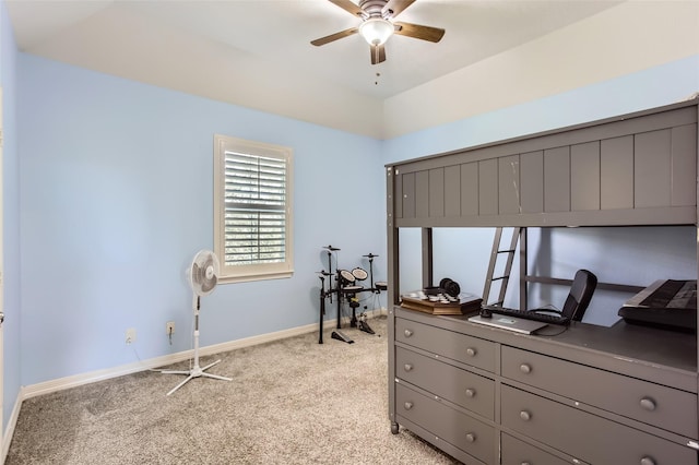 bedroom with a ceiling fan, light colored carpet, and baseboards