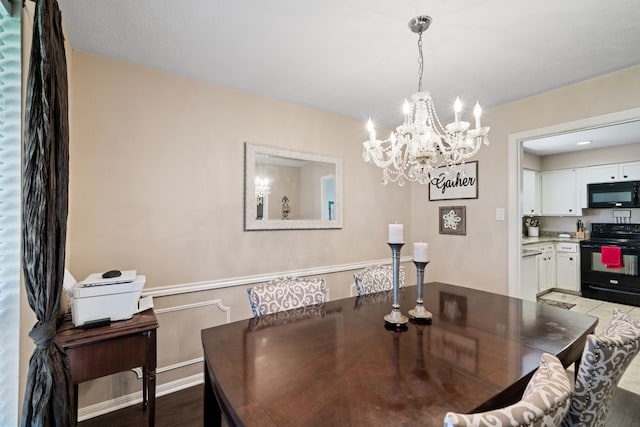 dining space featuring baseboards