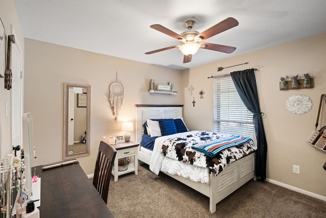 bedroom with baseboards, carpet, and ceiling fan