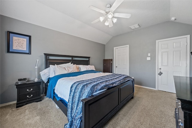 bedroom featuring visible vents, baseboards, lofted ceiling, and carpet floors