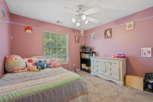 bedroom featuring visible vents, baseboards, a ceiling fan, and carpet flooring