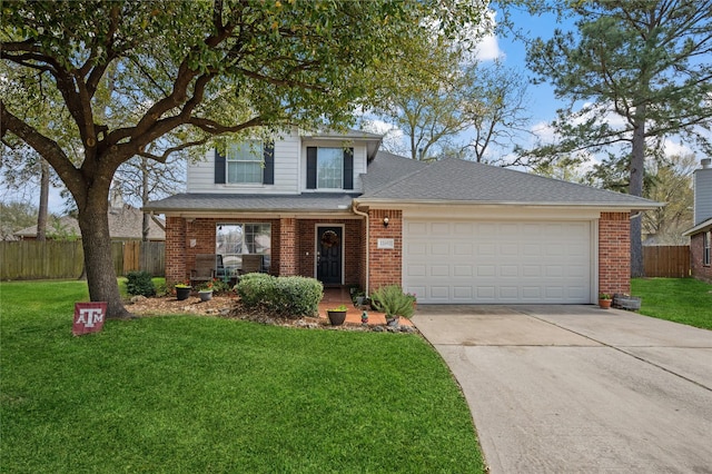 traditional-style house featuring a front lawn, a garage, and brick siding