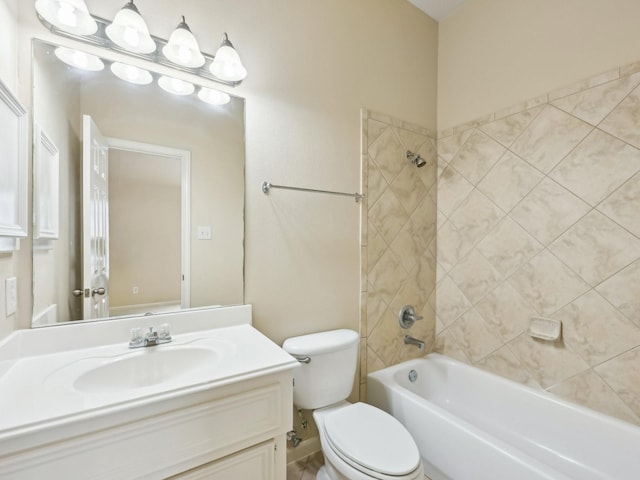 bathroom with vanity, toilet, and shower / bathtub combination