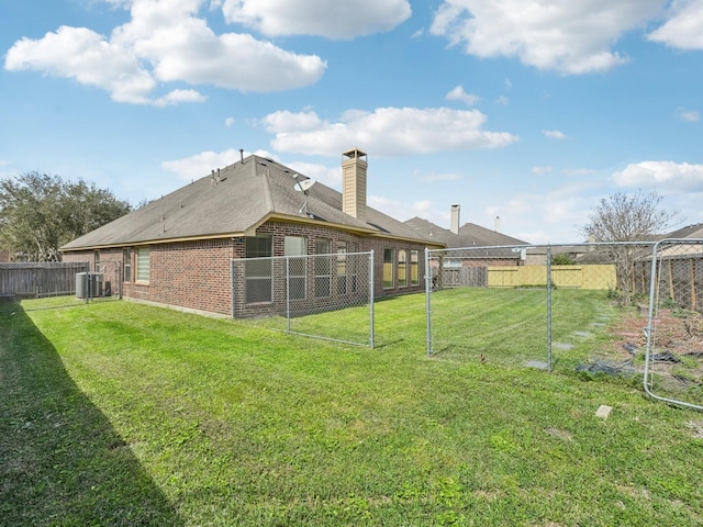 view of yard featuring cooling unit and a fenced backyard