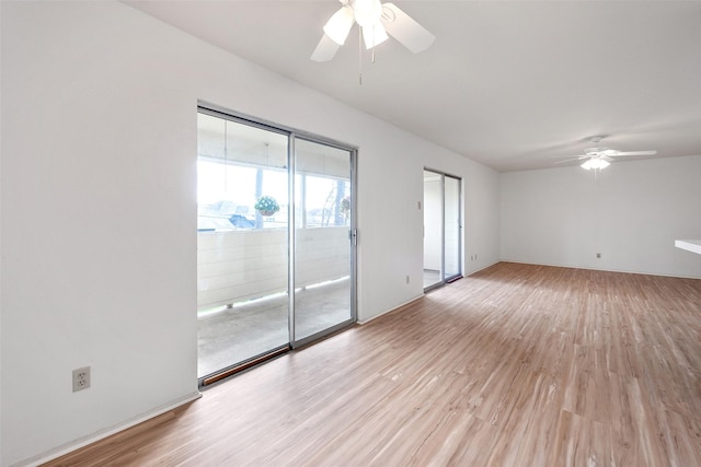 14515 Wunderlich Dr Unit 102, Houston, TX 77069 - empty room with a ceiling fan and light wood-style flooring