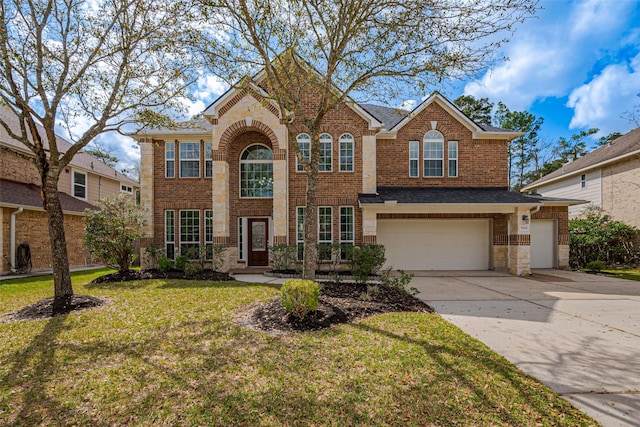 view of front facade featuring a front lawn, concrete driveway, a shingled roof, a garage, and brick siding