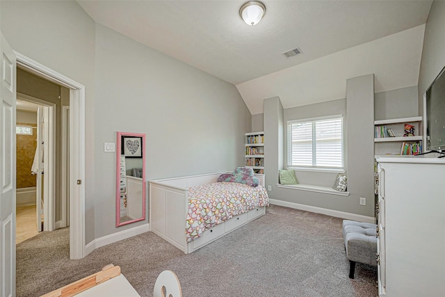 bedroom featuring carpet flooring, baseboards, visible vents, and vaulted ceiling