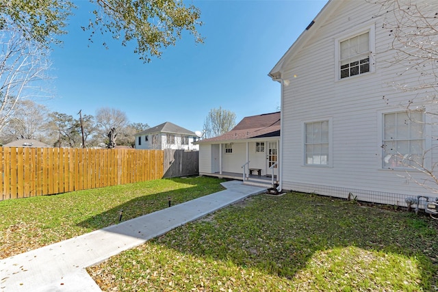 view of yard with fence