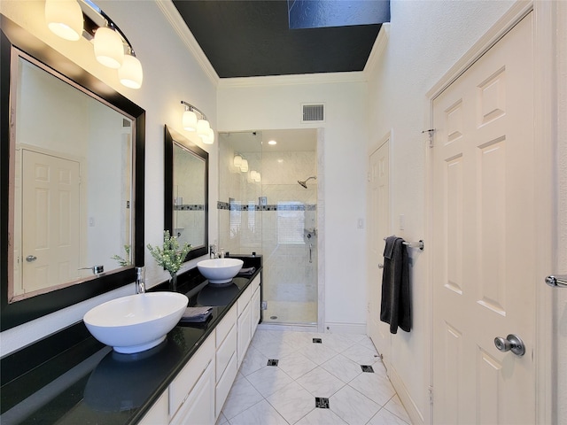 full bath with double vanity, ornamental molding, a stall shower, and a sink