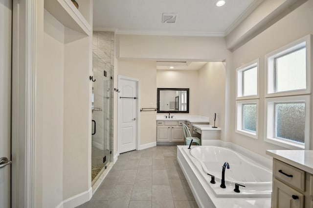 full bath featuring vanity, crown molding, a jetted tub, and a shower stall