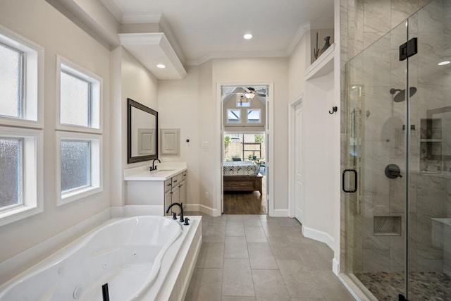 ensuite bathroom with baseboards, ceiling fan, a shower stall, crown molding, and a jetted tub