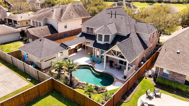 birds eye view of property with a residential view