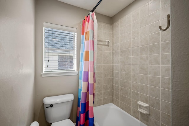 full bath with toilet and shower / tub combo with curtain