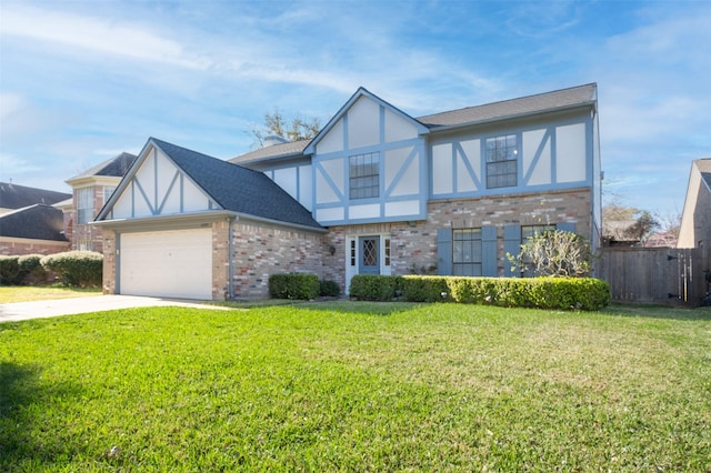 english style home with an attached garage, stucco siding, a front lawn, concrete driveway, and brick siding