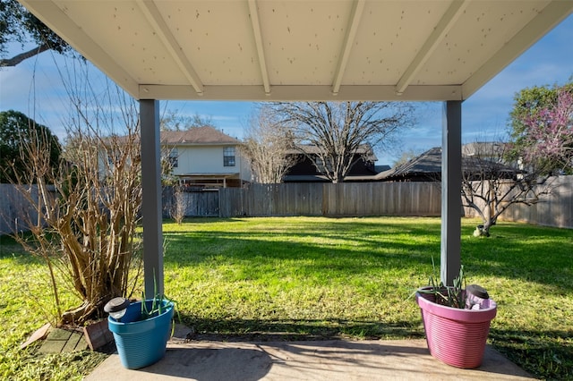 view of yard with a fenced backyard