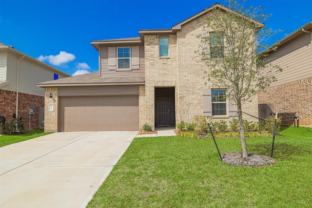 traditional home with brick siding, a garage, driveway, and a front yard