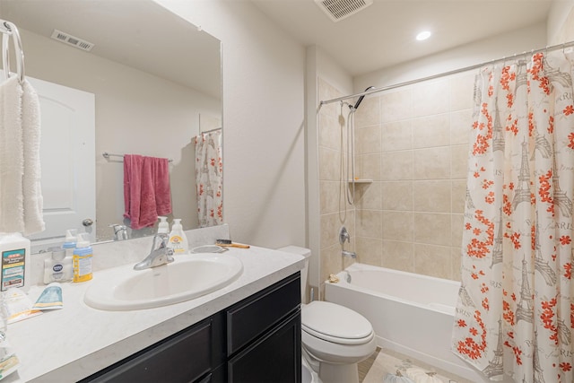 full bath featuring vanity, toilet, visible vents, and shower / tub combo with curtain