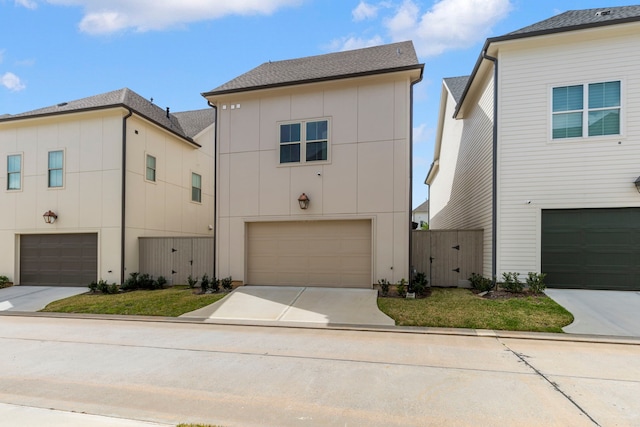 view of front of home featuring concrete driveway