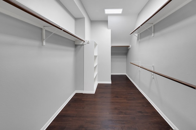 spacious closet with wood finished floors