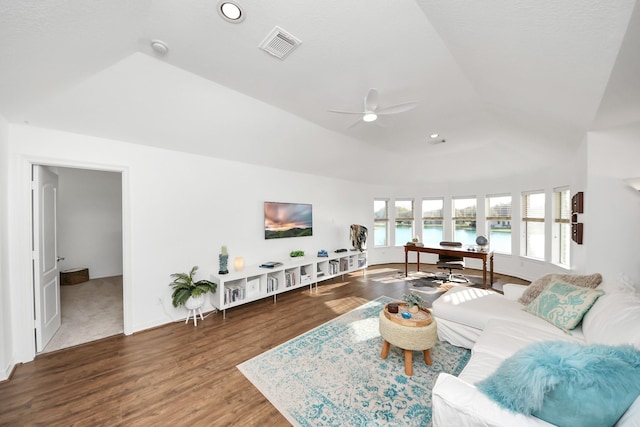 living room featuring visible vents, a ceiling fan, wood finished floors, recessed lighting, and a raised ceiling