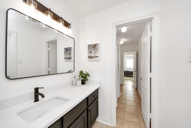 bathroom featuring tile patterned floors and vanity