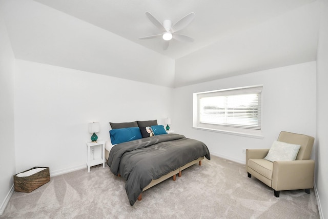 bedroom with baseboards, lofted ceiling, ceiling fan, and carpet flooring