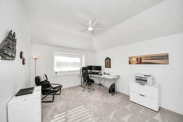 carpeted home office with baseboards, lofted ceiling, and a ceiling fan