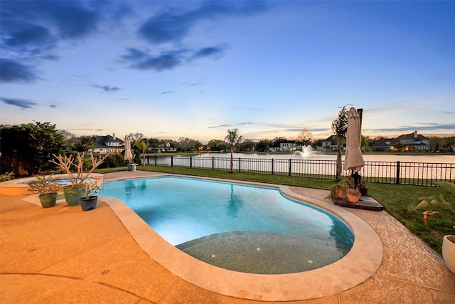 view of pool featuring a fenced in pool, a lawn, and fence