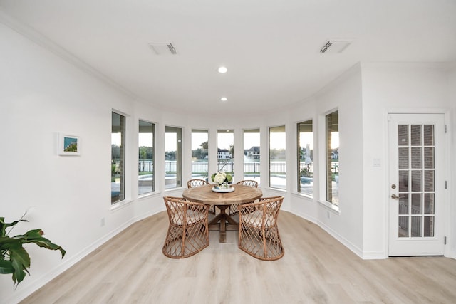 sunroom featuring visible vents