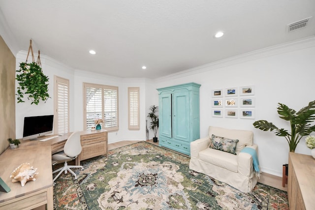 office space featuring baseboards, recessed lighting, visible vents, and ornamental molding