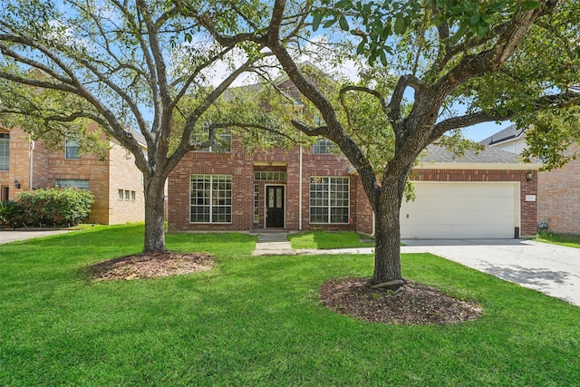 view of front of property with concrete driveway, a garage, brick siding, and a front yard