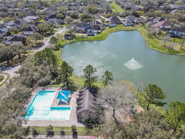 aerial view with a residential view and a water view