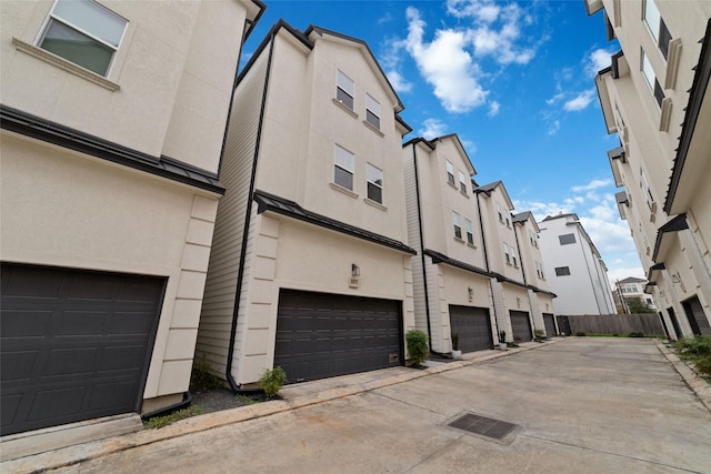1239 W 23rd St Unit A, Houston, TX 77008 - view of property featuring a residential view and an attached garage