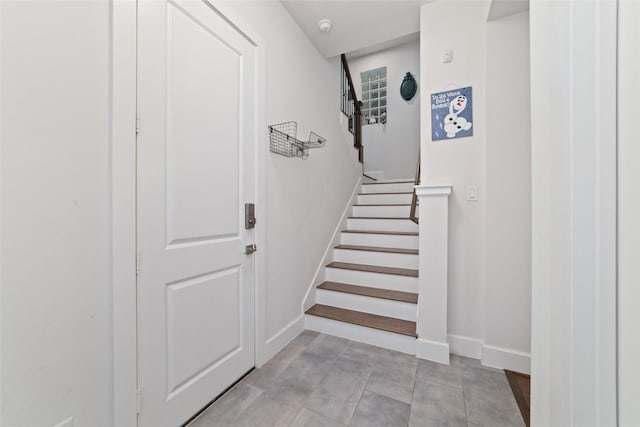 1239 W 23rd St Unit A, Houston, TX 77008 - stairway featuring baseboards