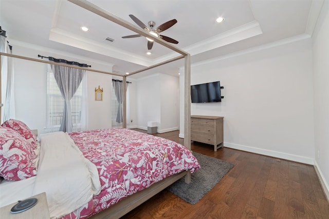 1239 W 23rd St Unit A, Houston, TX 77008 - bedroom featuring a tray ceiling, crown molding, hardwood / wood-style flooring, recessed lighting, and baseboards