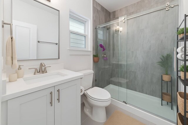 1239 W 23rd St Unit A, Houston, TX 77008 - full bath with toilet, vanity, a stall shower, and tile patterned floors