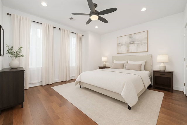 1239 W 23rd St Unit A, Houston, TX 77008 - bedroom featuring dark wood-style flooring, recessed lighting, ceiling fan, and baseboards