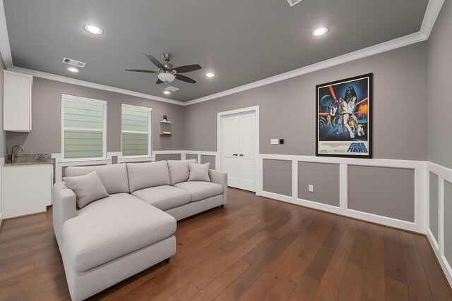 1239 W 23rd St Unit A, Houston, TX 77008 - living area with ceiling fan, dark wood-style flooring, ornamental molding, and recessed lighting