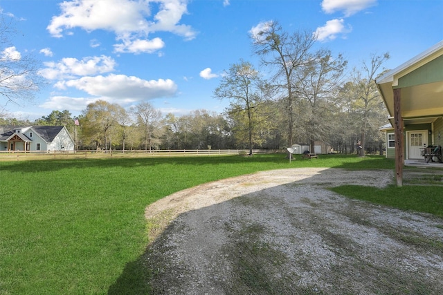 view of yard with fence